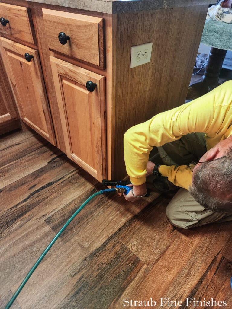 Putting in the final touches on the island cabinet end.