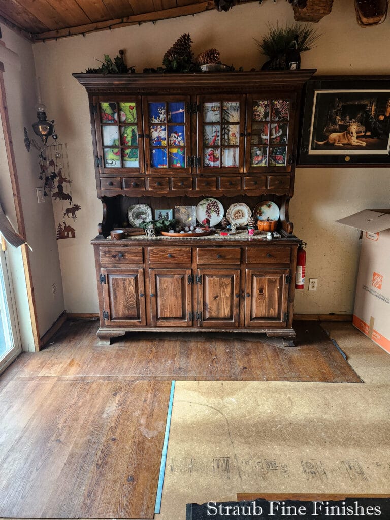 We even helped the homeowner refinish an antique walnut cabinet!