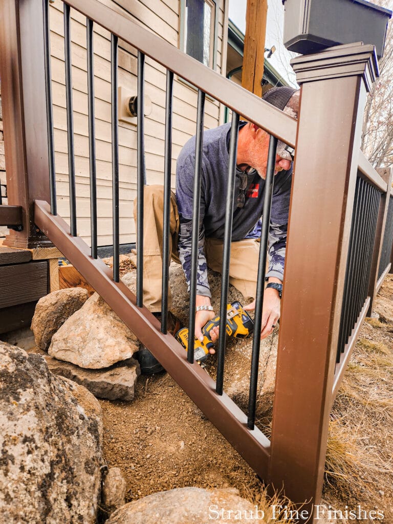 Definitely the hardest rail to engineer and install. The transition from deck to courtyard looks great though!