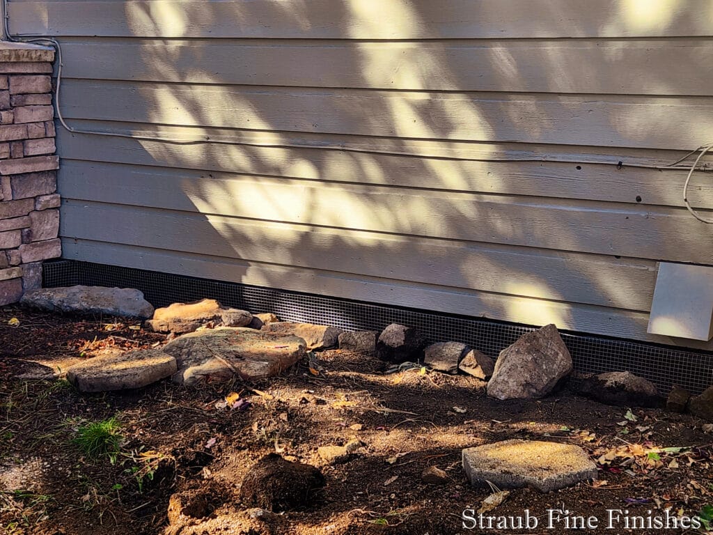 Addition of hardware cloth under the foundation to keep our critters. 