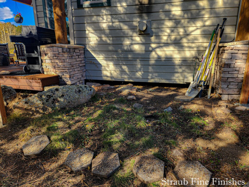 Deck site prep stacked stone landscaping