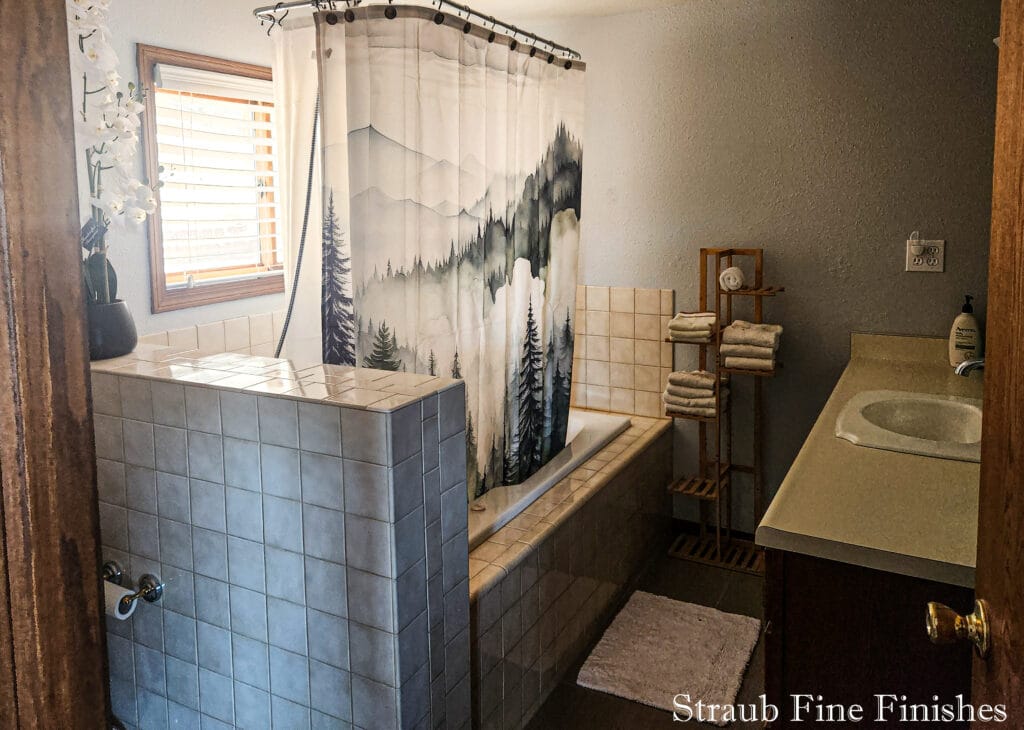Bathroom tiled tub mountain print curtain